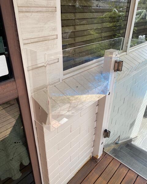 window next to pool barrier